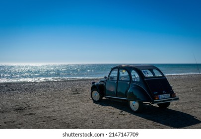 Motril, Granada - 05, 11, 2017: Citroën 2cv Parked On A Beach Of The Mediterranean Sea