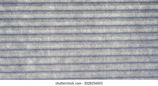 Mottled Blue Gray Slate Colored Textured Background With Horizontal Stripes. Close Up View Of Pleated Window Shade.