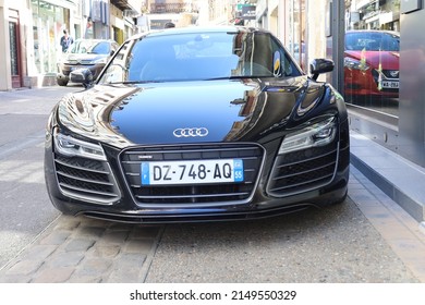 Moulins, France - 04 17 2022 : Audi R8 coupe, black 2-door German sports car, town of Moulins, Allier department, France