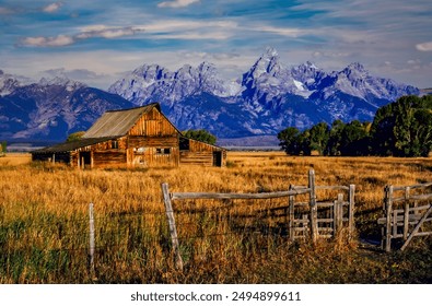 The Moulton barn in morning light in Grand Teton National Park Wyoming at Morman Row near Jackson Hole Wyoming - Powered by Shutterstock