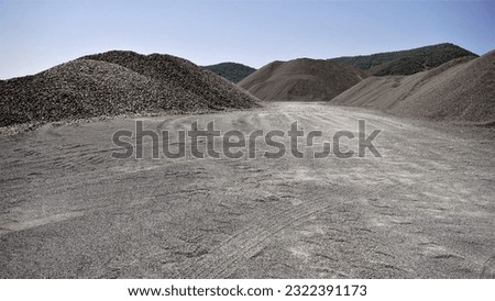 mounds of piled earth gravel as a background