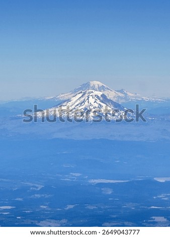 Mount Adams and Mount Rainier in alignment.