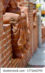 Mount Airy, North Carolina / USA - July 5, 2020: “The Whittling Wall” Brick Sculptures By Artist Brad Spencer Recognizes Fiddle Player Tommy Jarrell, Banjo Player Fred Cockerham, And Ralph Epperham. 