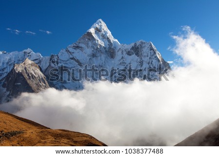 Mount Ama Dablam within clouds, way to Everest base camp, Khumbu valley, Sagarmatha national park, Everest area, nepalese himalayas, Nepal