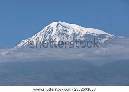 Mount Ararat covered with snow, dormant compound volcano in the extreme east of Turkey. View from the Armenian side.
