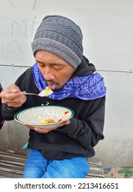 Mount Bromo Indonesia, 25 September 2022 - A Mount Bromo Jeep Driver Take A Breakfast During The Morning