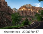 Mount Carmel Road Passes Below A Band Of Light On East Temple in Zion National Park