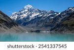 Mount Cook snowy peak and Hooker Lake, glacier view, Hooker Valley, New Zealand