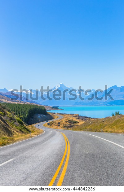 Mount cook\
viewpoint with the lake pukaki and the road leading to mount cook\
village in South Island New\
Zealand.