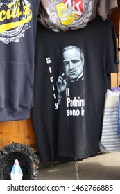 Mount Etna - Italy / July 24, 2019. A Souvenir In The Shops Around The Cableway Station On Mount Etna: A T-shirt With The Godfather (Marlon Brando)