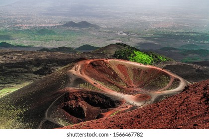 Mount Etna, Sicily - Tallest active volcano of Europe 3329 m in Italy. Panoramic wide view of the active volcano Etna, extinct craters on the slope, traces of volcanic activity.
