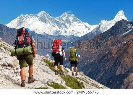 Mount Everest, Mt Ama Dablam, three hikers, way to Mt Everest base camp, Khumbu valley, Sagarmatha national park, Everest area, Nepal Himalaya mountain