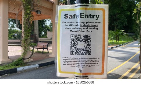 Mount Faber, Singapore,-Circa October 2020,- A Notice Tied To A Pole Requesting Park User In Mount Faber Park,Singapore To Scan QR Code To Check In For Contact Tracing Purposes During This Pandemic.