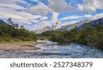 Mount Fitz Roy, located in Patagonia, on the border between Argentina and Chile. Its striking granite peaks rise dramatically above the surrounding wilderness.