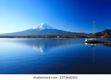 Mount Fuji seen in winter in Lake Kawaguchi, Japan