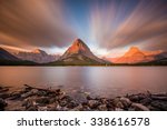 Mount Grinnell at Sunrise from the shores of Swiftcurrent Lake in Glacier National Park, Montana