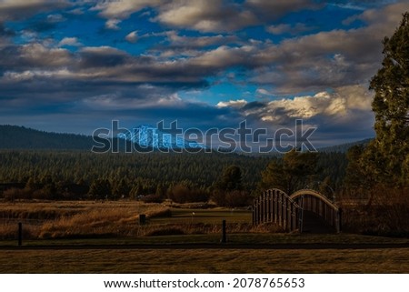 Similar – Image, Stock Photo Sunriver Oregon at dusk, the Deschutes River with beautiful colors from the sky reflect off the still water