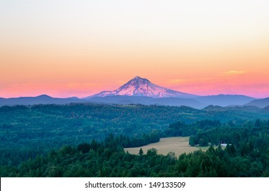 Mount Hood At Sunset With A Purple Glow