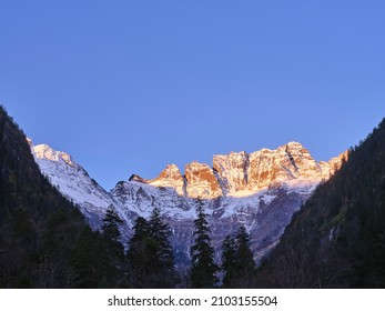 mount jiariren-an of the meili snow mountains at sunrise in china's yunnan province