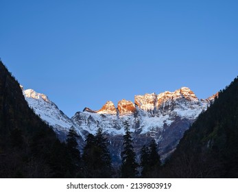 mount jiariren-an of the meili snow mountains at sunrise in china's yunnan province