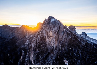 Mount Kinabalu peak with light of sunrise on Mount   trip travel, hiking in Kinabalu national park. Kota kinabalu - Malaysia. - Powered by Shutterstock