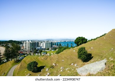Mount Maunganui urban center from slop of landmark Mount Maunganui - Shutterstock ID 2234908747