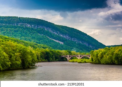 Mount Minsi and the Delaware River seen from from a pedestrian bridge in Portland, Pennsylvania.