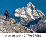 mount Nanda Devi with hiker, one of the best mounts in Indian Himalaya, seen from Joshimath Auli,  Uttarakhand, India, Indian Himalayas mountains