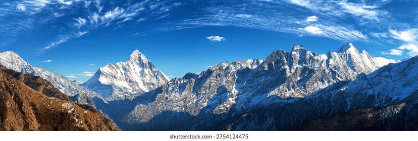 mount Nanda Devi peak with beautiful clouds, one of the best mounts in Indian Himalayas, seen from Joshimath Auli, Uttarakhand, mount Nanda Devi India himalaya mountain, panoramic view