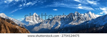 mount Nanda Devi peak with beautiful clouds, one of the best mounts in Indian Himalayas, seen from Joshimath Auli, Uttarakhand, mount Nanda Devi India himalaya mountain, panoramic view
