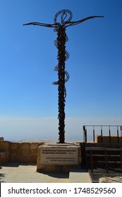 MOUNT NEBO, JORDAN – SEPTEMBER 10TH, 2019: The Brazen Serpent Monument atop Mount Nebo (the Biblical location where Moses stood looking out at the Promised Land), Jordan