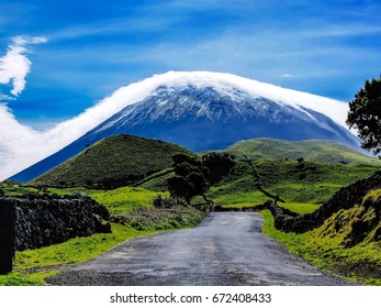 Mount Pico in the Azores archipelago. This dormant volcano rises 2350 metres from the lush green landscape of Pico, and is Portugal's highest mountain.