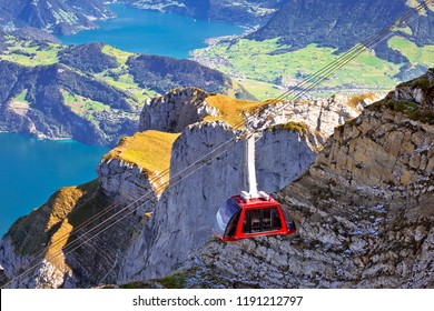 Mount Pilatus aerial cabelway above cliffs and Lake Lucerne landscape, Switzerland