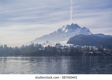 Mount Pilatus in the fog from Lake Luzern - Powered by Shutterstock