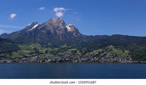 Mount Pilatus looming over the municipality of Hergiswil, in the canton of Nidwalden, Switzerland.