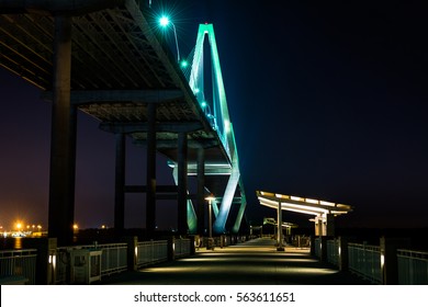 The Mount Pleasant Pier and Arthur Ravenel Bridge at night, in Charleston, South Carolina.