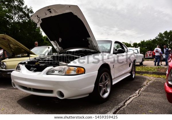 Mount Pleasant, Wisconsin / USA - July 21,\
2019: A white fourth generation Mustang with custom front air\
bumper at the Quarry Lake Car\
Show.