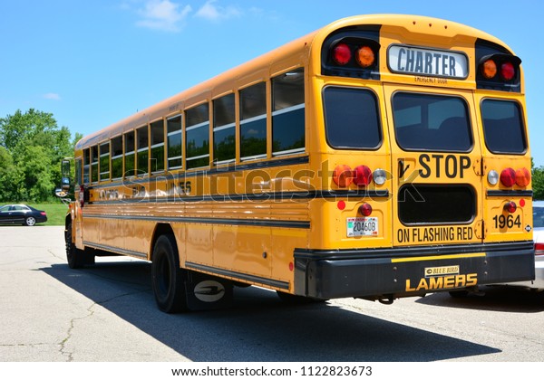 Mount Pleasant, Wisconsin /\
USA: June 28, 2018.  A chartered school bus arrived at Smolenski\
Park. 