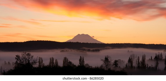 Mount Rainier Behind Fog in Valley Cascade Mountain Sunrise