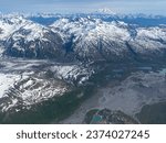 Mount Redoubt Volcano, Tuxedni Bay, Lake Clark National Park in Alaska. Aerial view of Redoubt Volcano an active stratovolcano and highest summit in Aleutian Range.