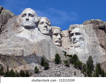 Mount Rushmore National Monument in South Dakota.  Summer day with clear skies. - Shutterstock ID 113115559