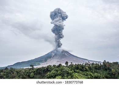 Mount Sinabung spews thick ash and smoke into the sky in Karo, North Sumatra , Indonesia