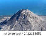 Mount St. Augustine is an active volcano in the Chigmit Mountains of the Aleutian chain on Augustine Island