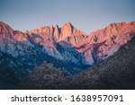 Mount Whitney bathed in the red glow of sunrise