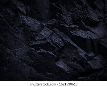  Mountain background texture. Close-up. Black rock background. Dark gray stone background. Black and white background. Black grunge texture. Contrast monochrome rocky texture. Detail.                
