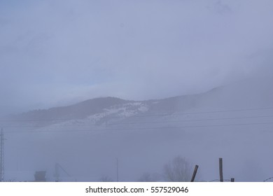 Mountain behind clouds