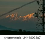 Mountain behind a operating network tower