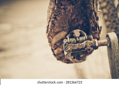 Mountain Bike Clipless Shoes With Mud And Dirt Stuck In The Pedal 