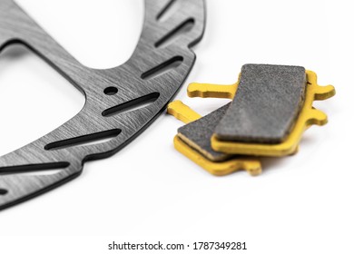 mountain bike, disk and pads brake on the white background, closeup