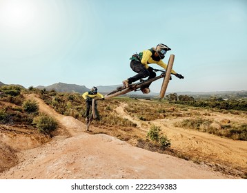 Mountain Bike, Extreme Sports Jump And Outdoor Dirt Track For Friends On Cycling Adventure In Nature. Bicycle Team Ride, Mountain Hill Rocks And Action Race With Speed, Stunt And Danger Trick In Air